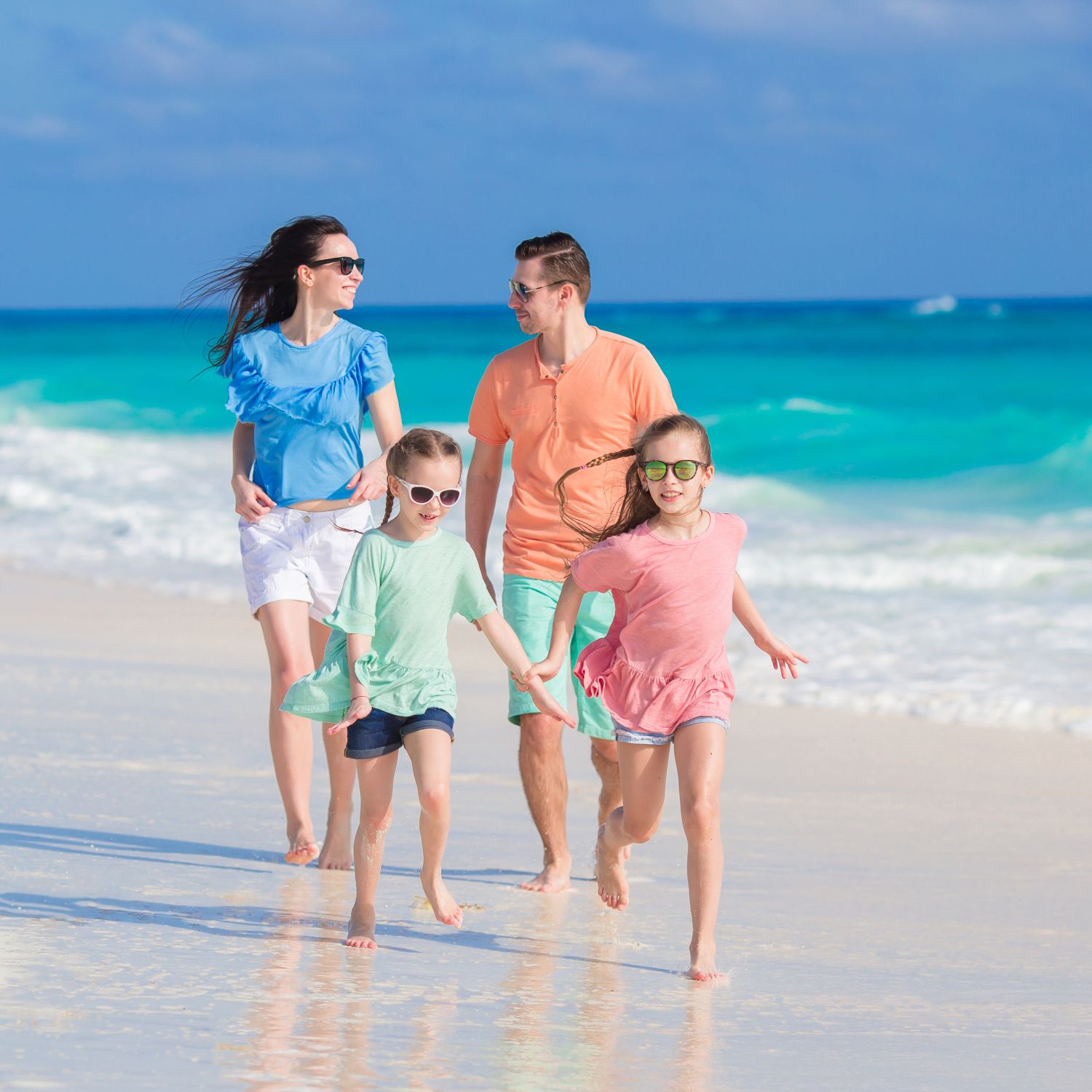 A family enjoying a beach vacation