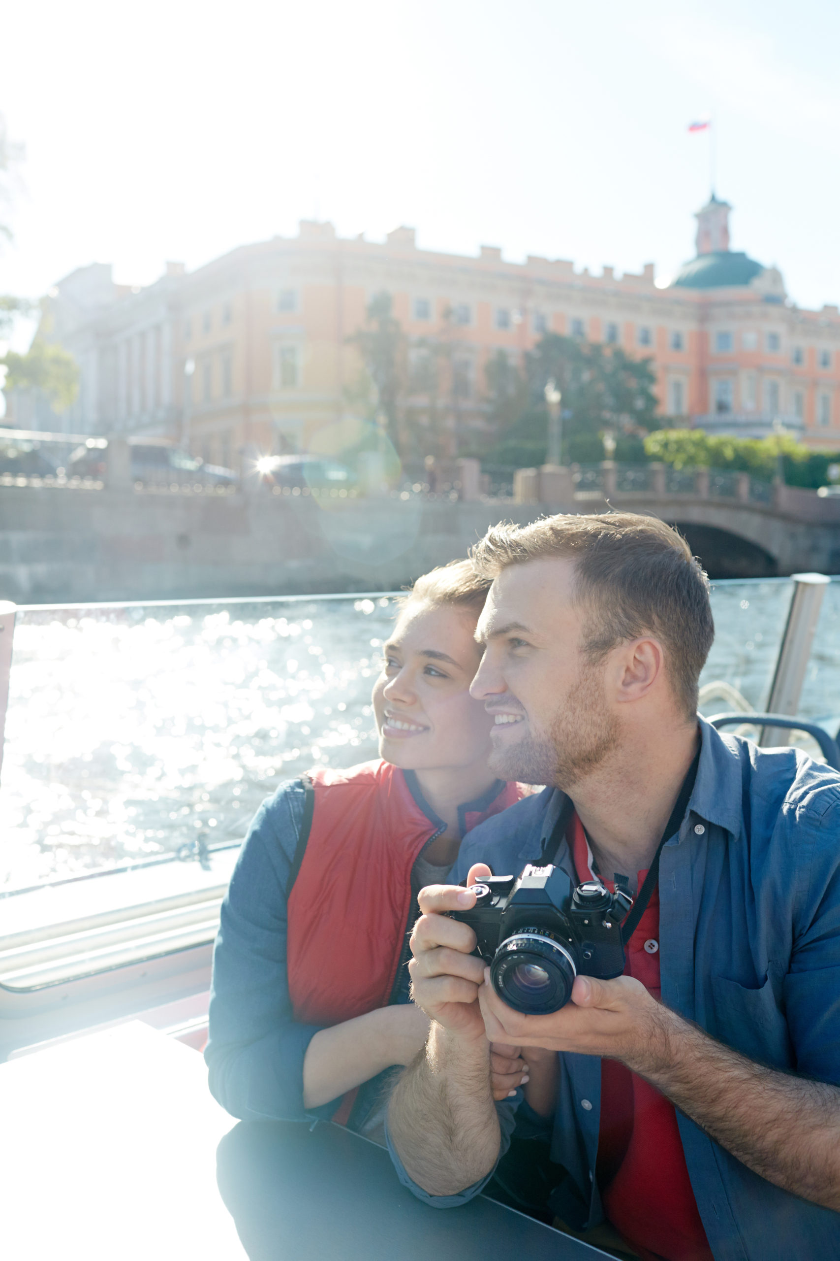 A couple sightseeing on a cruise